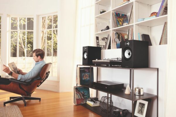 High-606-Matte-Black-Grille-Off-with-Rotel-A14-Record-Male-Lifestyle-2